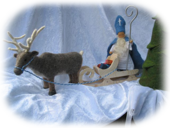 Nikolaus mit Rentier und Schlitten